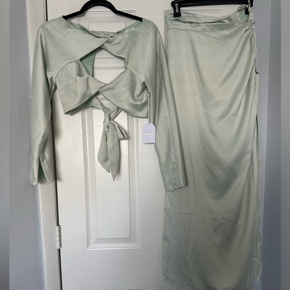 2 PIECE MIDI CROP TOP AND MIDI SKIRT SET.